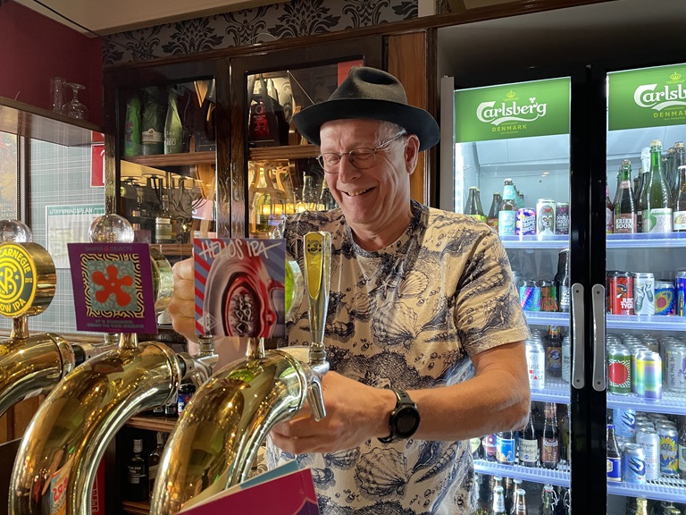 The happy barman.